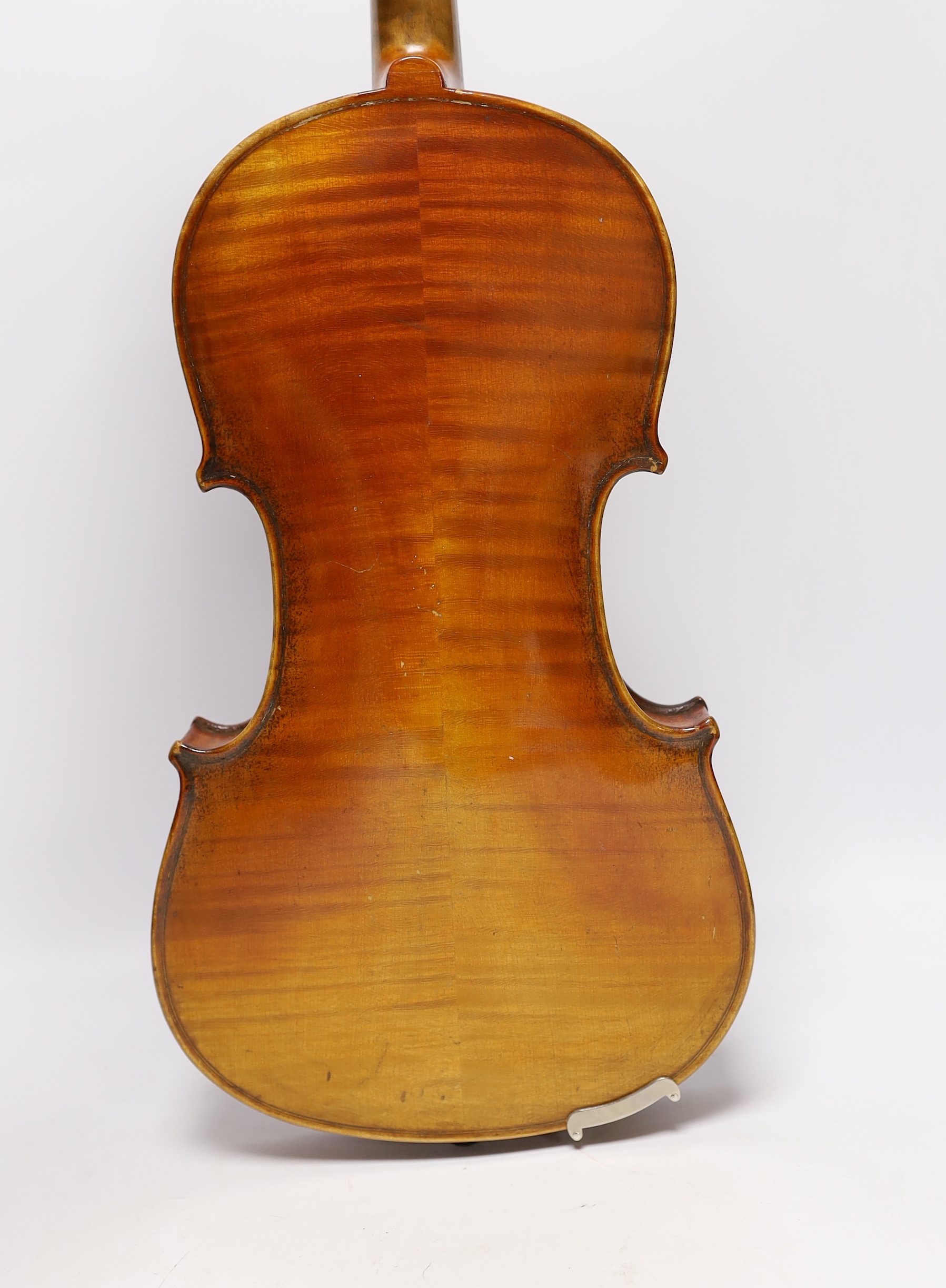 A cased early 20th century French violin, bears Strad label